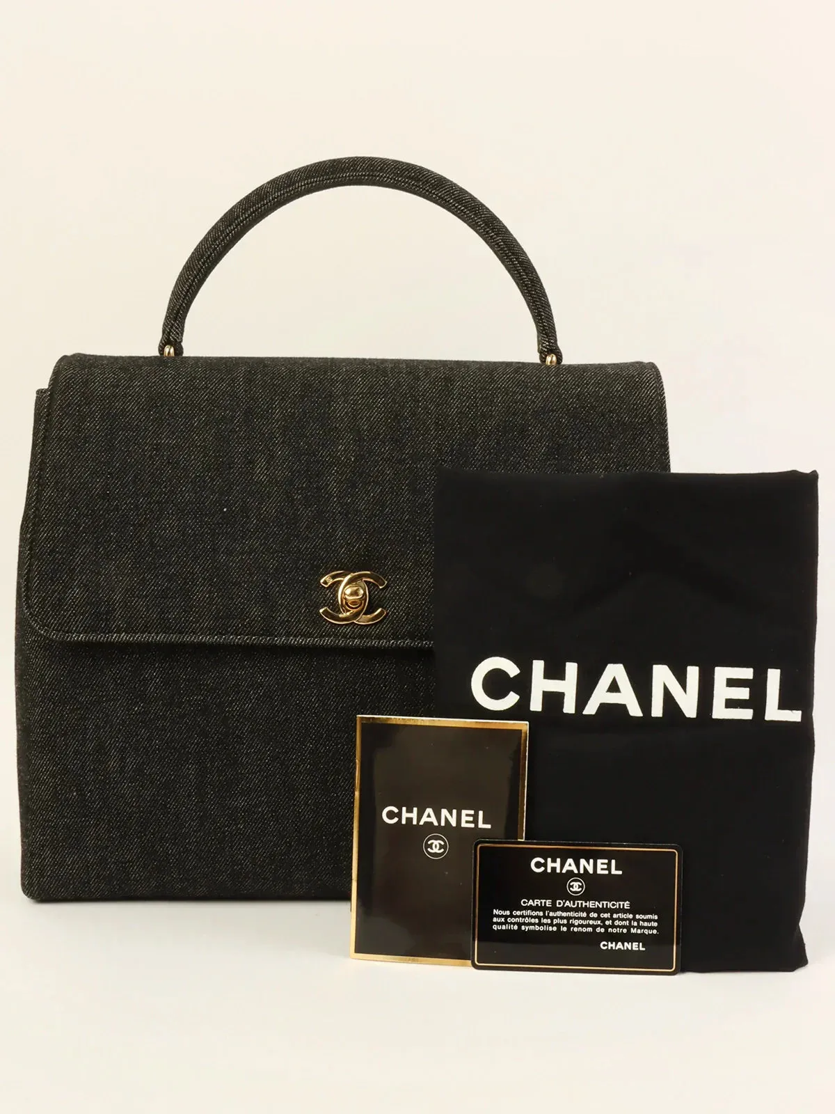 CHANEL Around 1998 Made Denim Turn-Lock Top Handle Bag Black